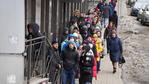 Russians Scramble To Banks As Ruble Hits Record Low