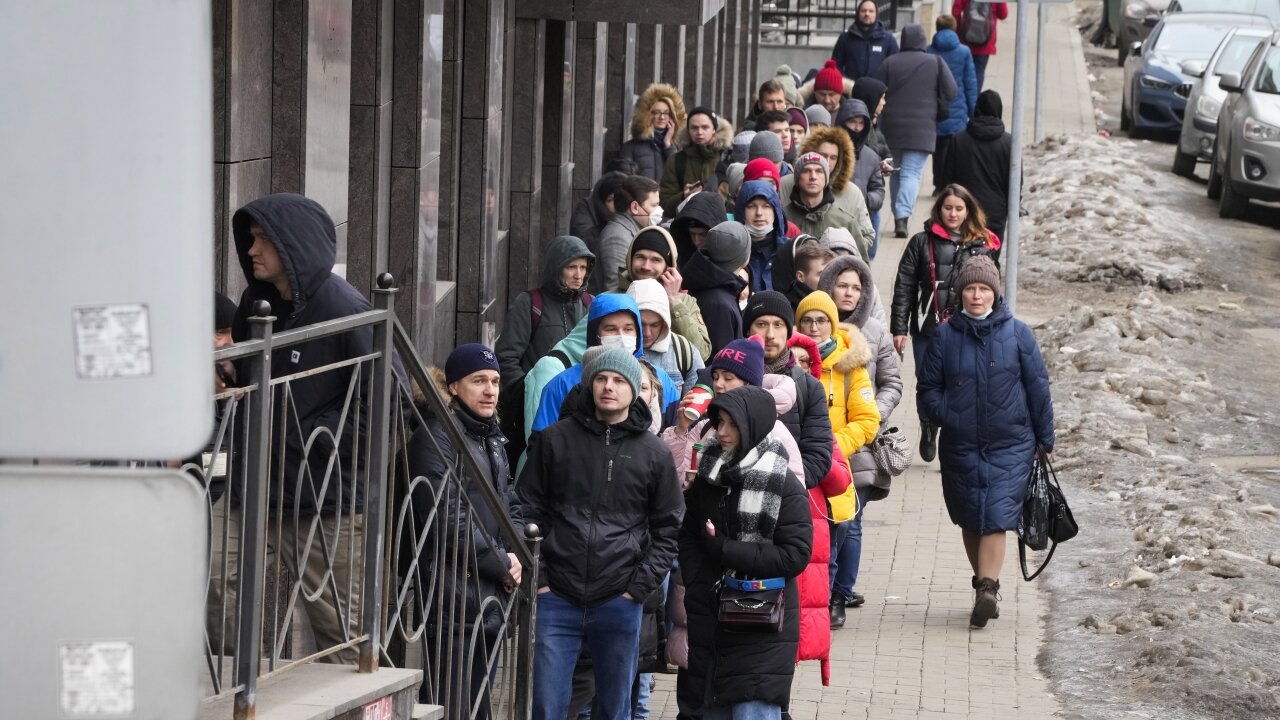 Russians Scramble To Banks As Ruble Hits Record Low