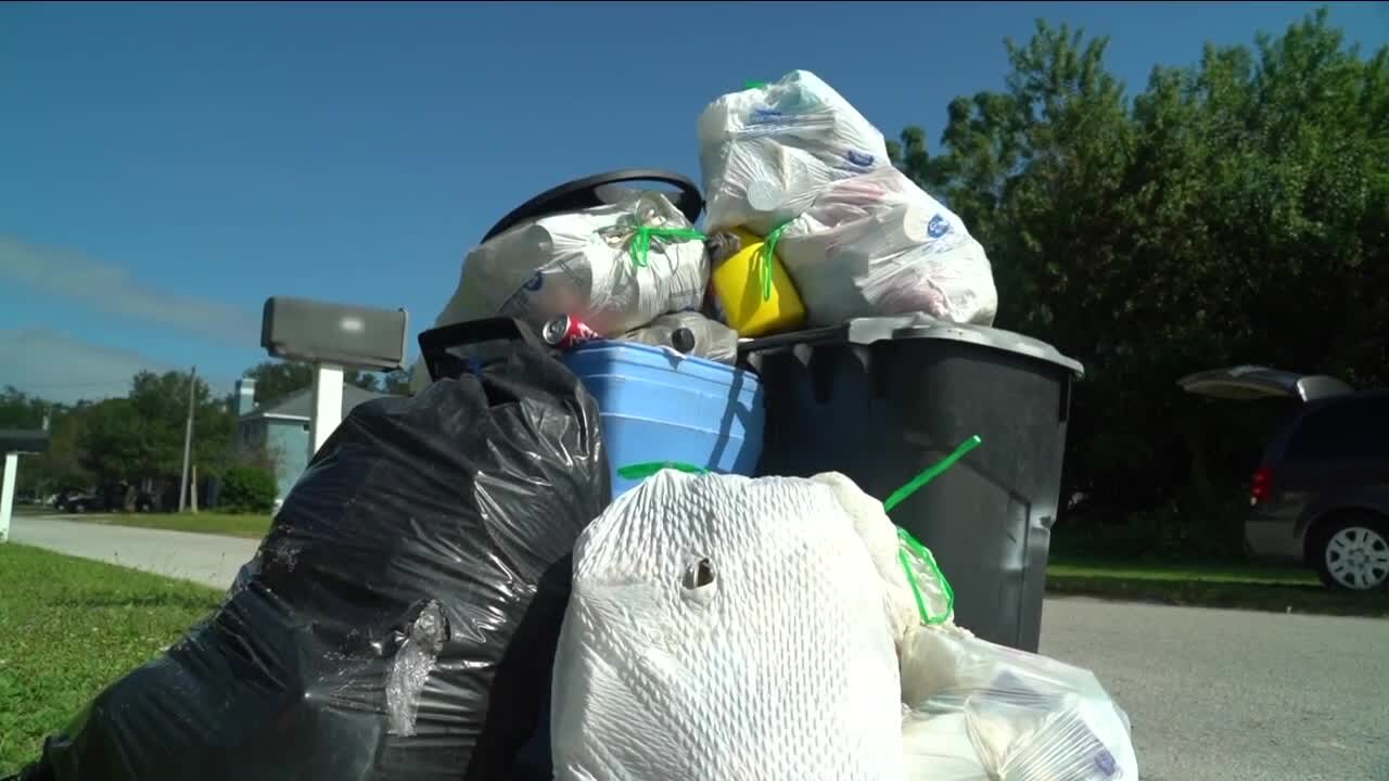 Garbage piled up outside Clearwater family's home after trash truck stopped coming