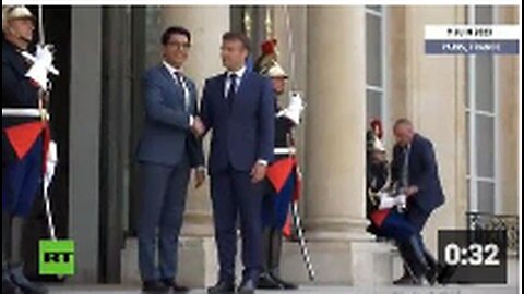 French Guard Collapses Right in Front of French Puppet President Macron