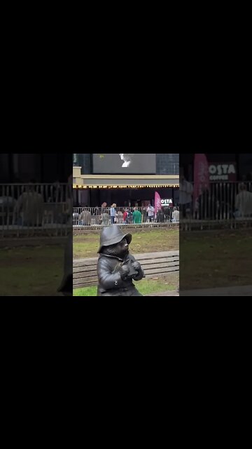 The queen over looking Paddington Bear in Leicester Square #london