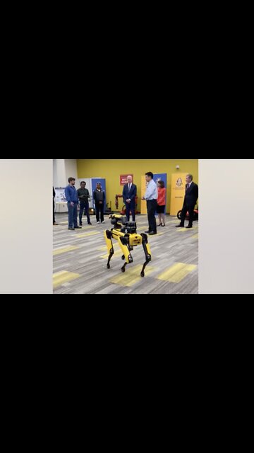 Biden Inspects Dog Robot