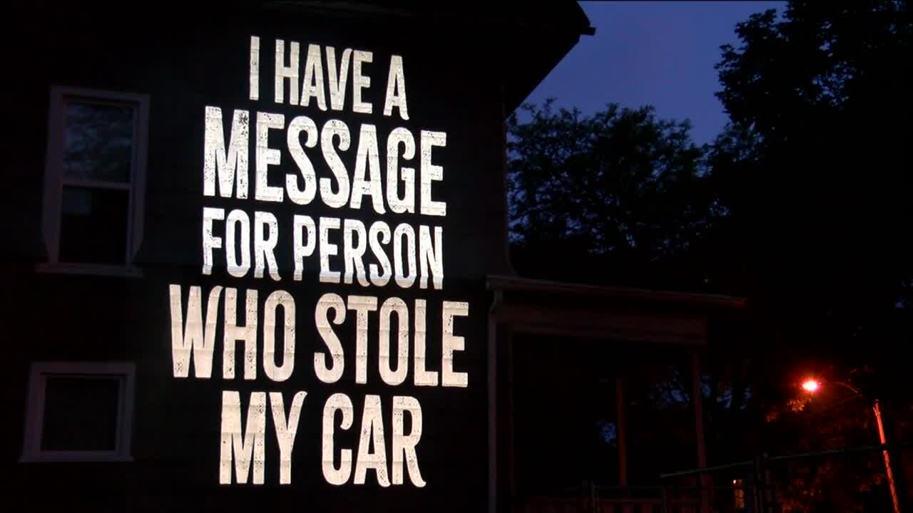 Woman calls out car thief with creative message projected on her house