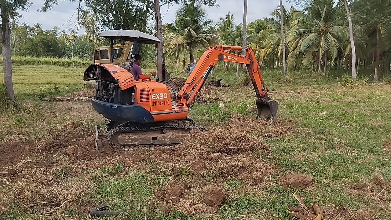 Hithachi ex -30 mini excavator clearing land and operator skills