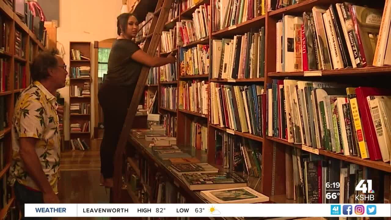 One Tank Trips: Daisha turns pages at Prospero's Bookstore