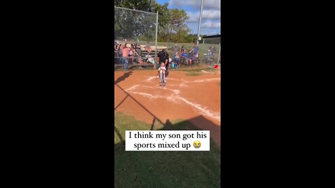 baseball kid hits ball then tackles kid