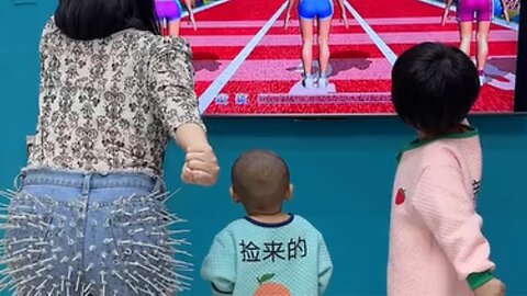 Mother is teaching cute baby girl how to run