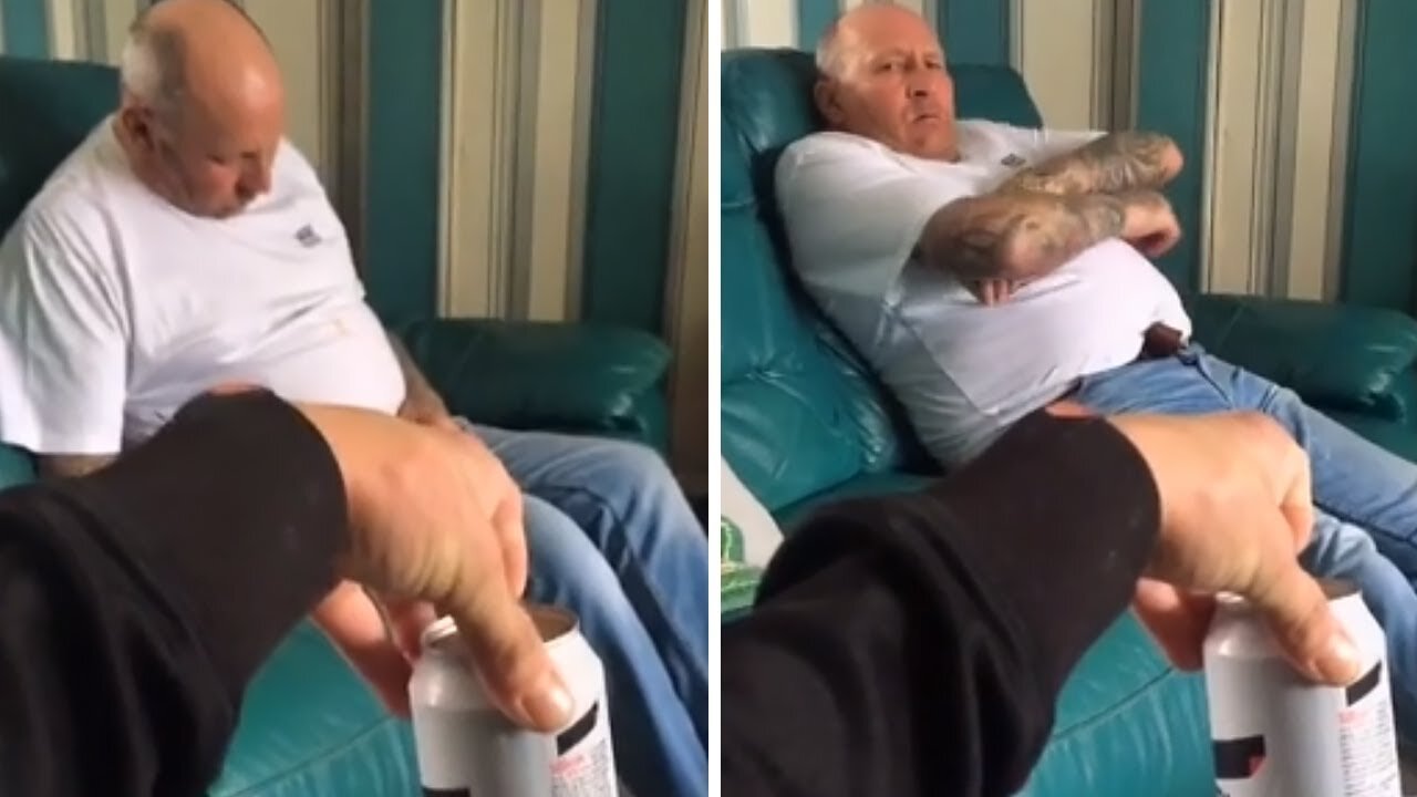 Dad jolts awake at the sound of a beer can being opened