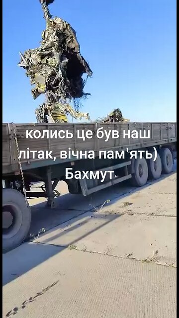 Truck picks up the remains of Downed Ukrainian MiG-29.
