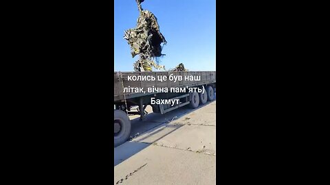 Truck picks up the remains of Downed Ukrainian MiG-29.