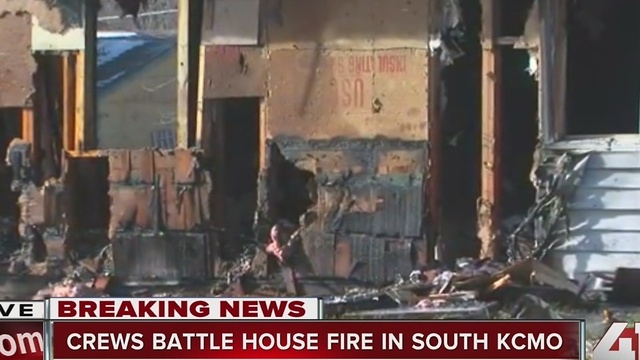 Crews battle house fire in south KCMO