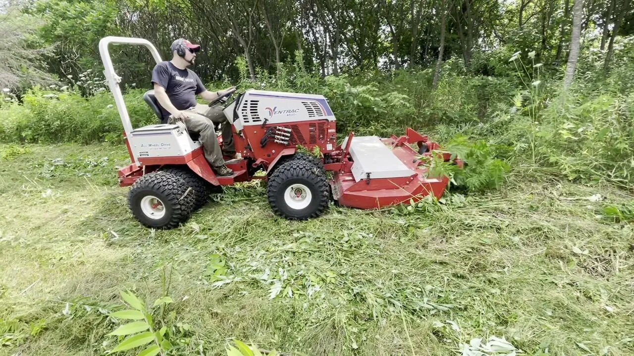 Ventrac 4500Y diesel Mowing steep over hill side.