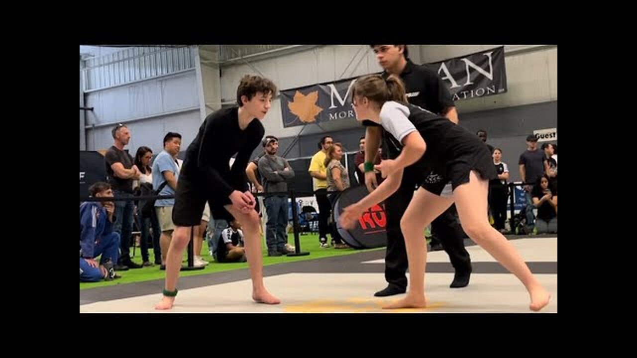 Girl beats guy Aubrey takes on a strong opponent at the PBJJF Spring Open