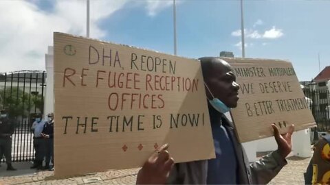 A group of Foreign Nationals, dressed in traditional regalia staged a demonstration on a red carpet outside Parliament today.