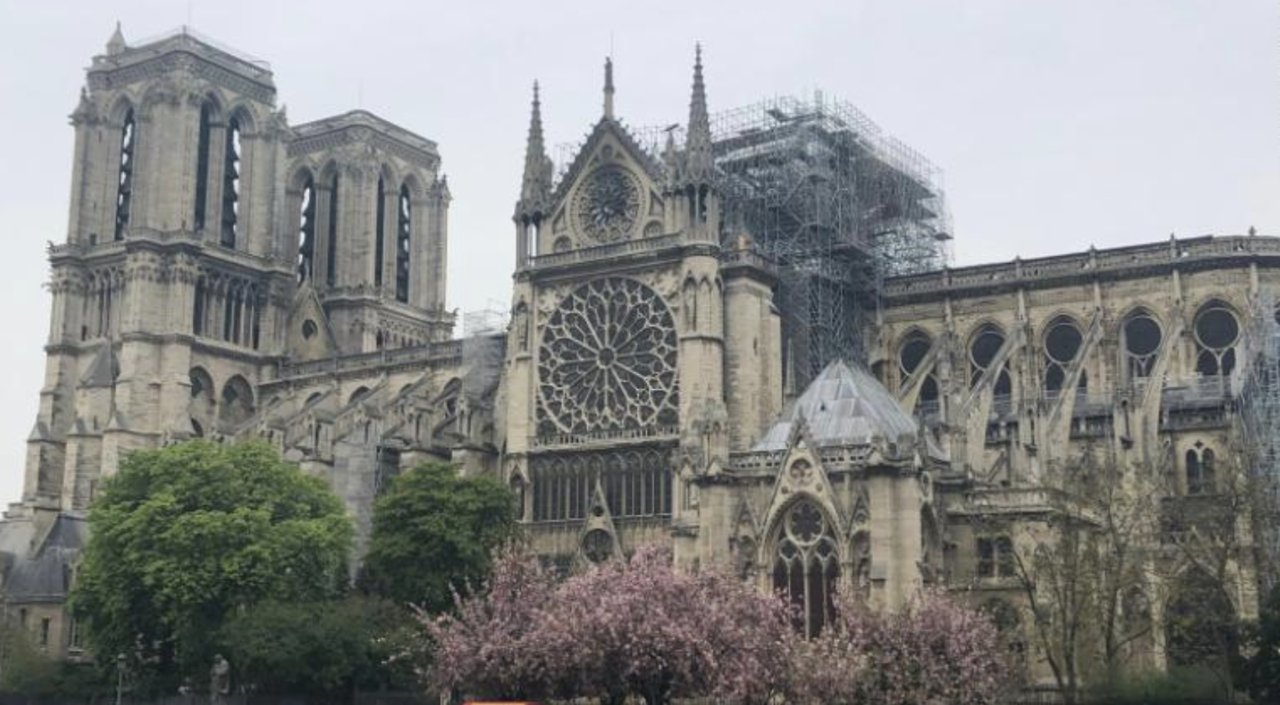 French president promises to rebuild Notre Dame