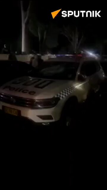 Protestors ransack police cars after famous preacher stabbed in Sydney, Australia. (Sputnik news)
