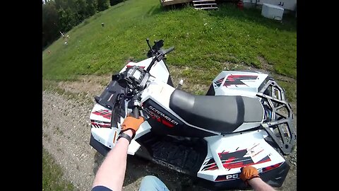 Polaris Scrambler XP 1000 ride to check whether grass can be cut, too much ground water on east sid