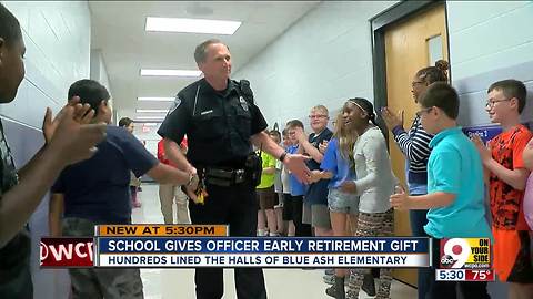 Blue Ash Elementary surprises retiring police officer with hugs, high fives