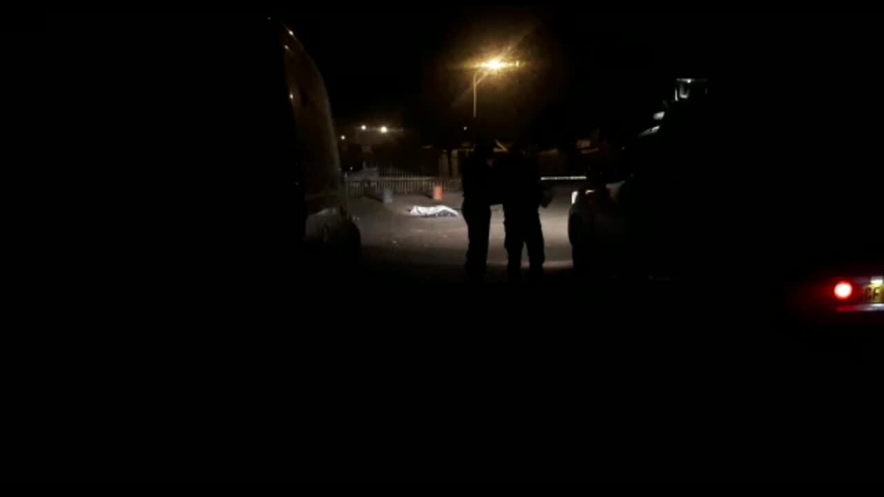 South Africa - Cape Town - Two dead bodies laying on the Street (video) (Q8j)
