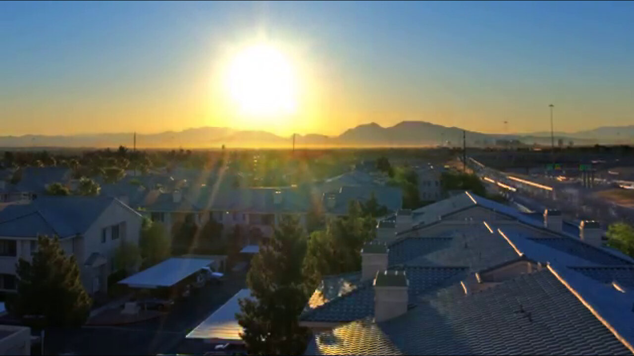 Sunrise Time Lapse HD Video 1080p Footage Views of Rising Sun over a City with Houses and Traffic