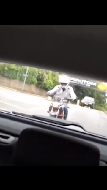 Biker Doesn't Look Whilst Driving And Crashes Into Sign In The UK #41