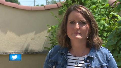 A woman who lost her family members in a fire speaks at a Mid-Day Women's Alliance luncheon