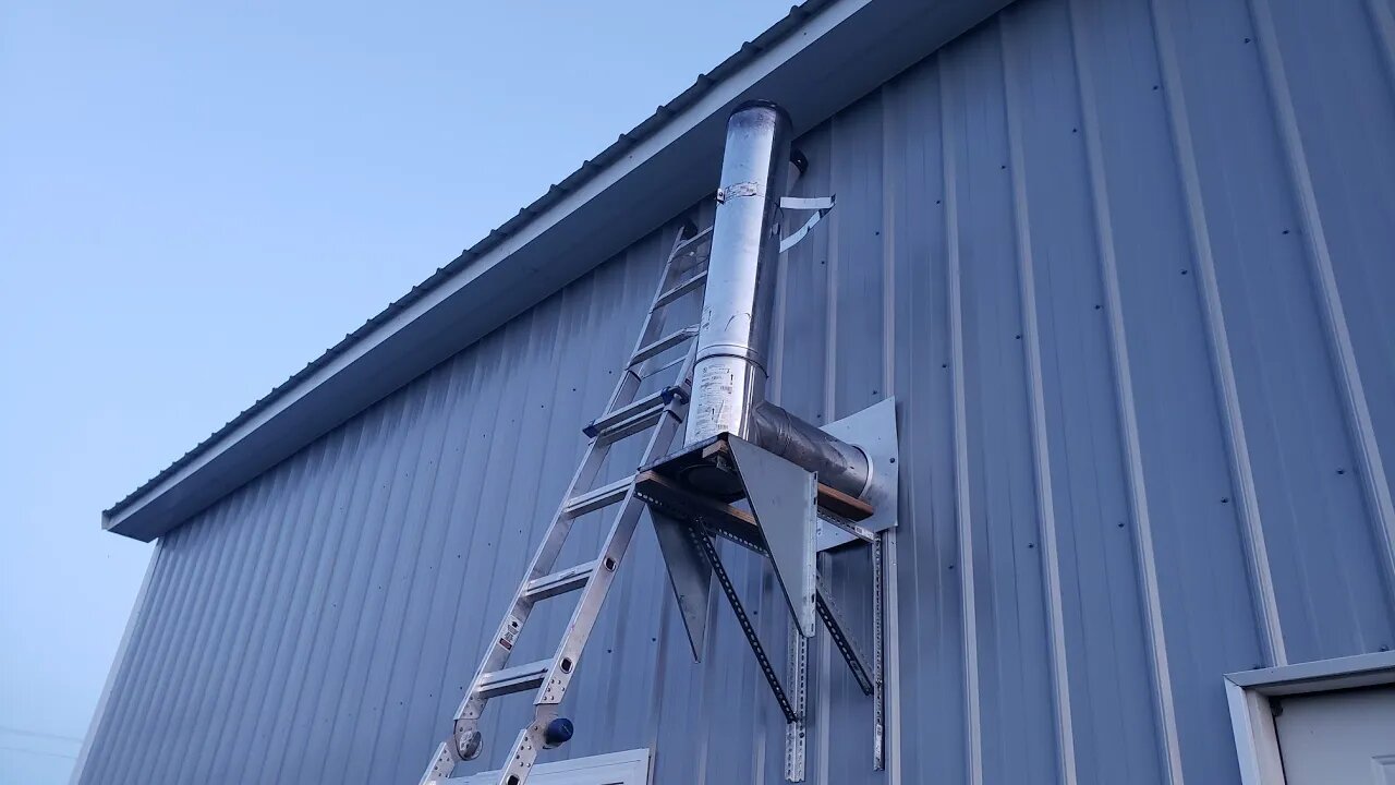 How I Install a chimney pipe through the wall with a 1 foot over hang for my wood burning stove DIY