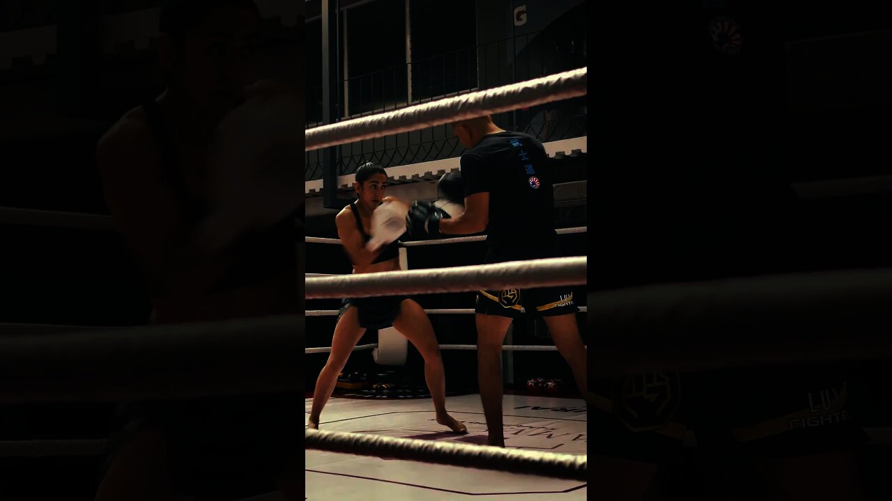 A young female boxer training # Shorts