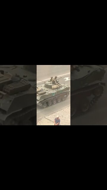 Women on the street Zaporozhye region. They stand and baptize our equipment and our fighters