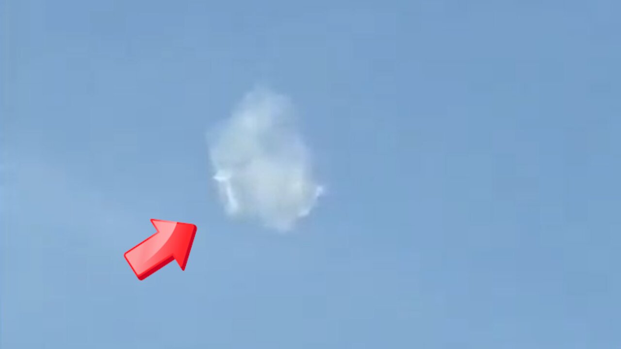 Small UFO mimicking a cloudy sky over a residential area [Space]