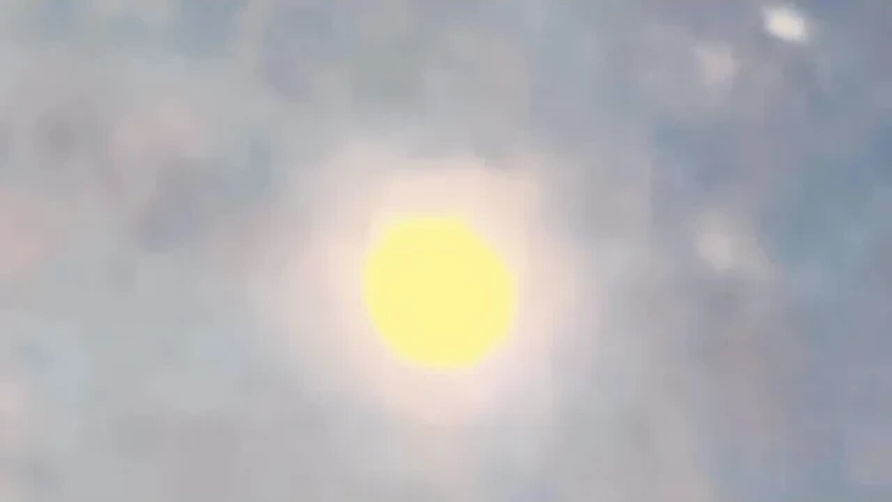 large Sphere UFO gains altitude overhead