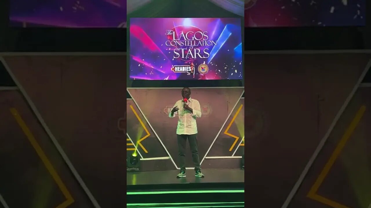 comedian AY on stage with governor of Lagos at Lagos Constellation of Stars Event