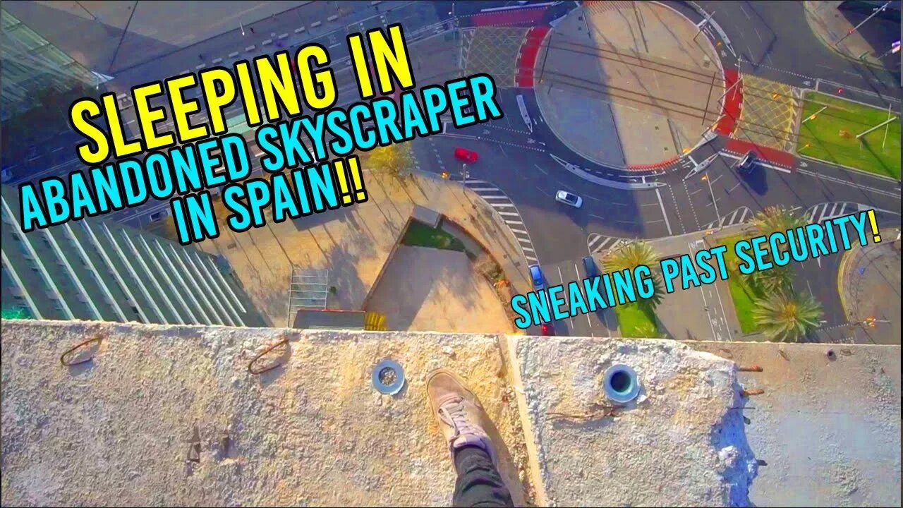 SLEEPING IN SKETCHY ABANDONED SKYSCRAPER IN SPAIN! *SNEAKING PAST SECURITY*