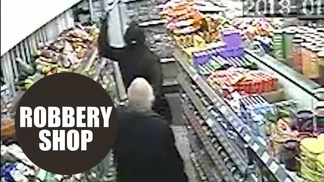 Dramatic CCTV shows have-a-go-hero shopkeeper fighting off robbers with HAMMERS