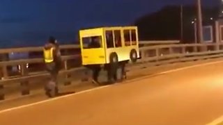 Russians dress as "human bus" in attempt to get across vehicle-only bridge