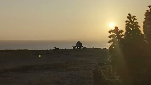 Sunset for two and a dog