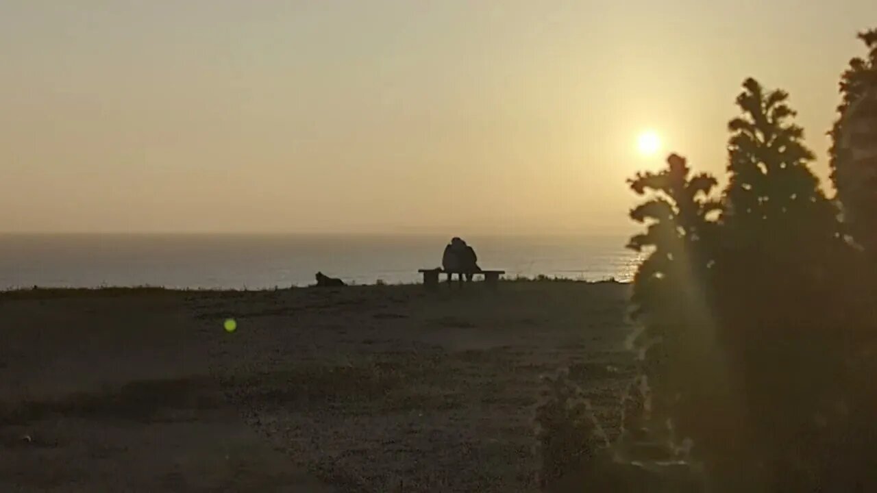 Sunset for two and a dog