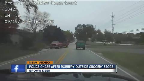 Police chase suspect after robbery outside grocery store