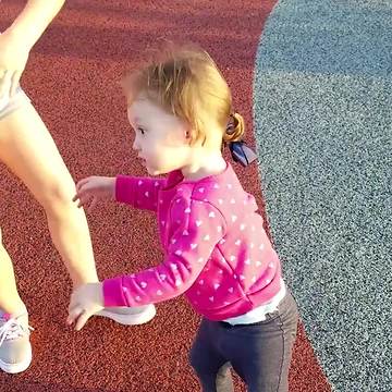 Cute Girl Gets Dizzy In A Playground