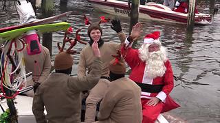 Santa Claus goes water skiing | Rare People