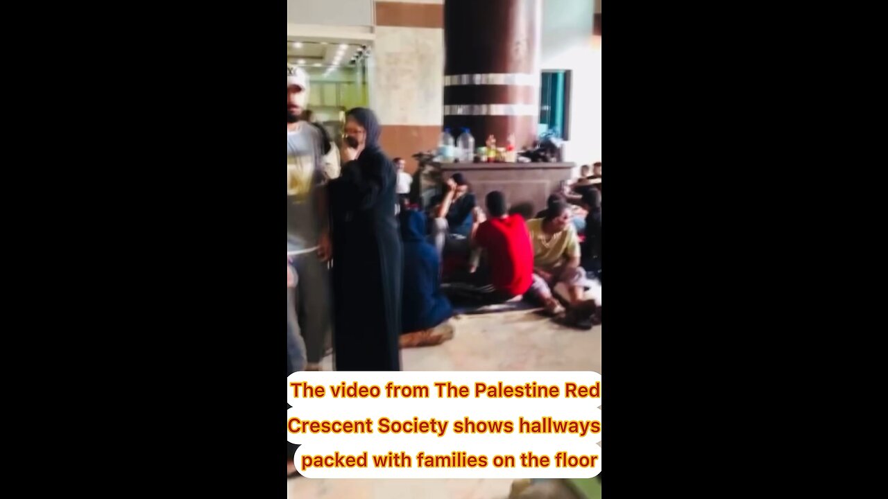 The video from The Palestine Red Crescent Society shows hallways packed with families on the floor