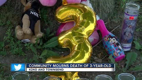 Strangers mourn 3-year-old killed in road rage shooting