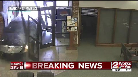 Car drives into Catoosa bank after driver accidentally hits accelerator