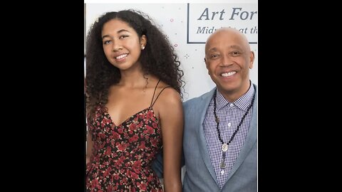 Aoki Simmons dresses her father Russell Simmons