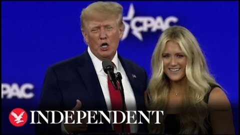 Watch moment Trump welcomes anti-trans swimmer onstage at CPAC