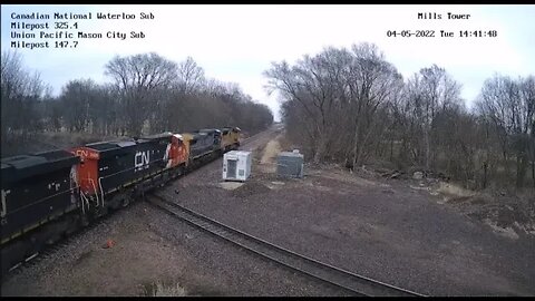 UP 5109 Leading EB CN L570 Manifest with CSX 9012 YN2 at Mills Tower on April 5, 2022