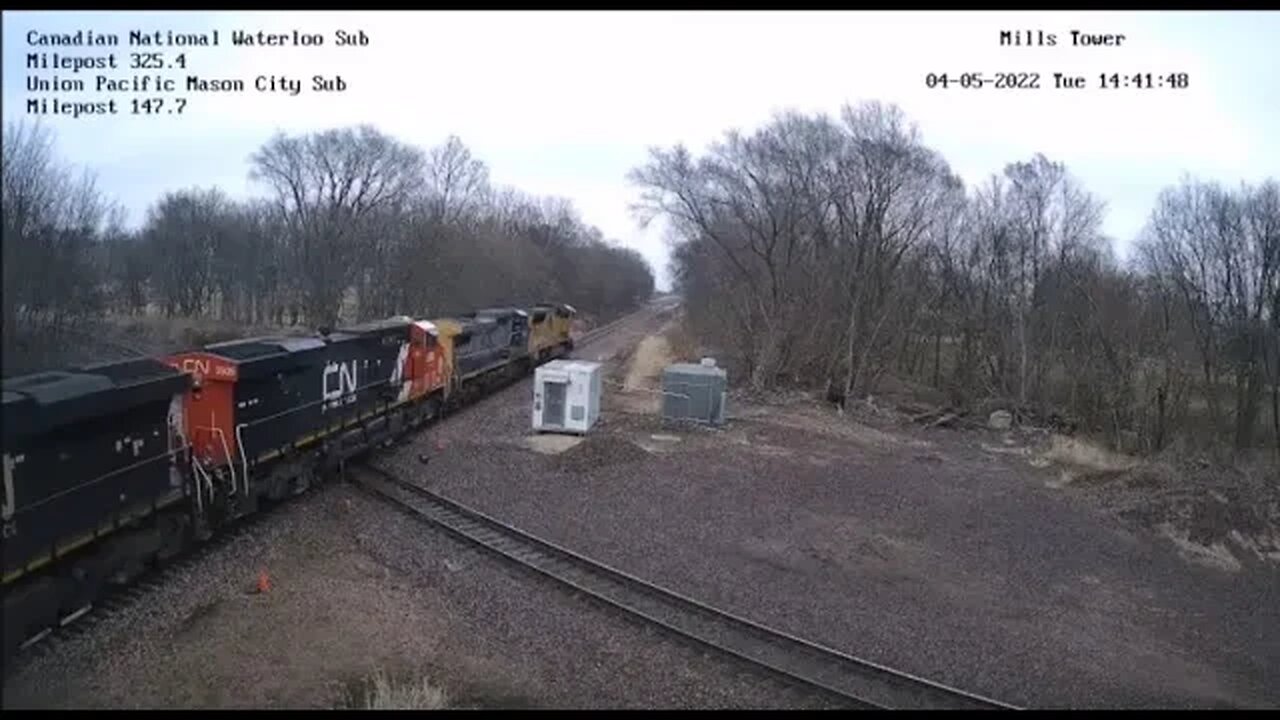 UP 5109 Leading EB CN L570 Manifest with CSX 9012 YN2 at Mills Tower on April 5, 2022