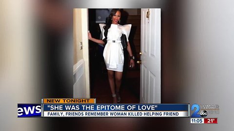 Community holds vigil for woman who was killed helping friend escape domestic violence