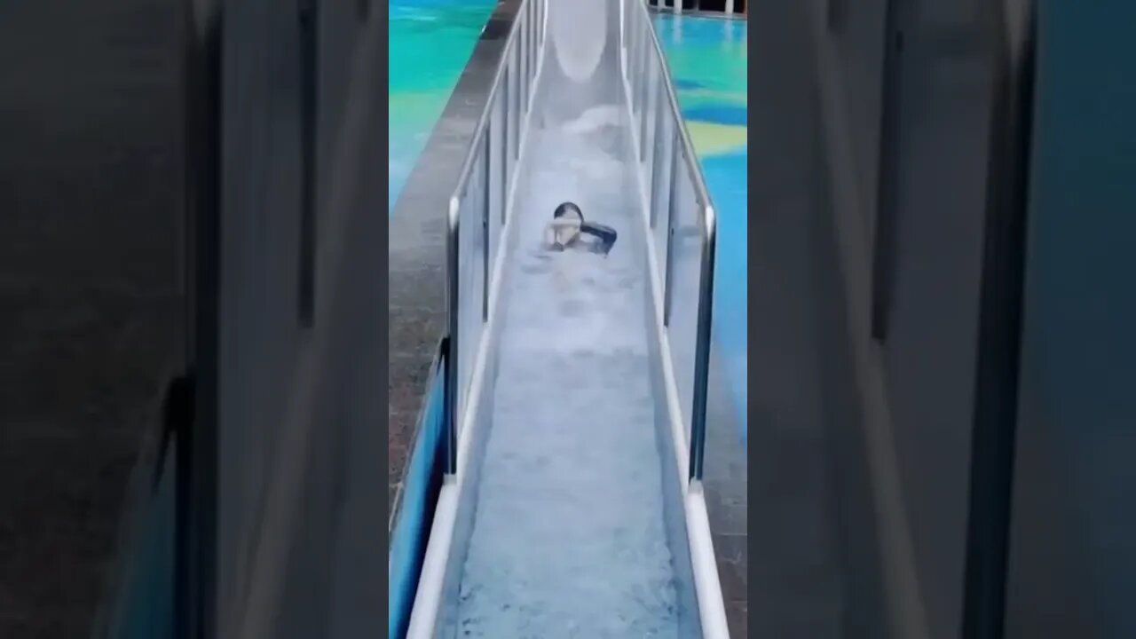 Chinese Girl Braves Steep Waterslide