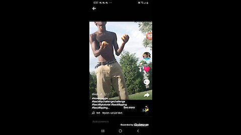 Boy juggles, does backflip, and solves rubiks cube.
